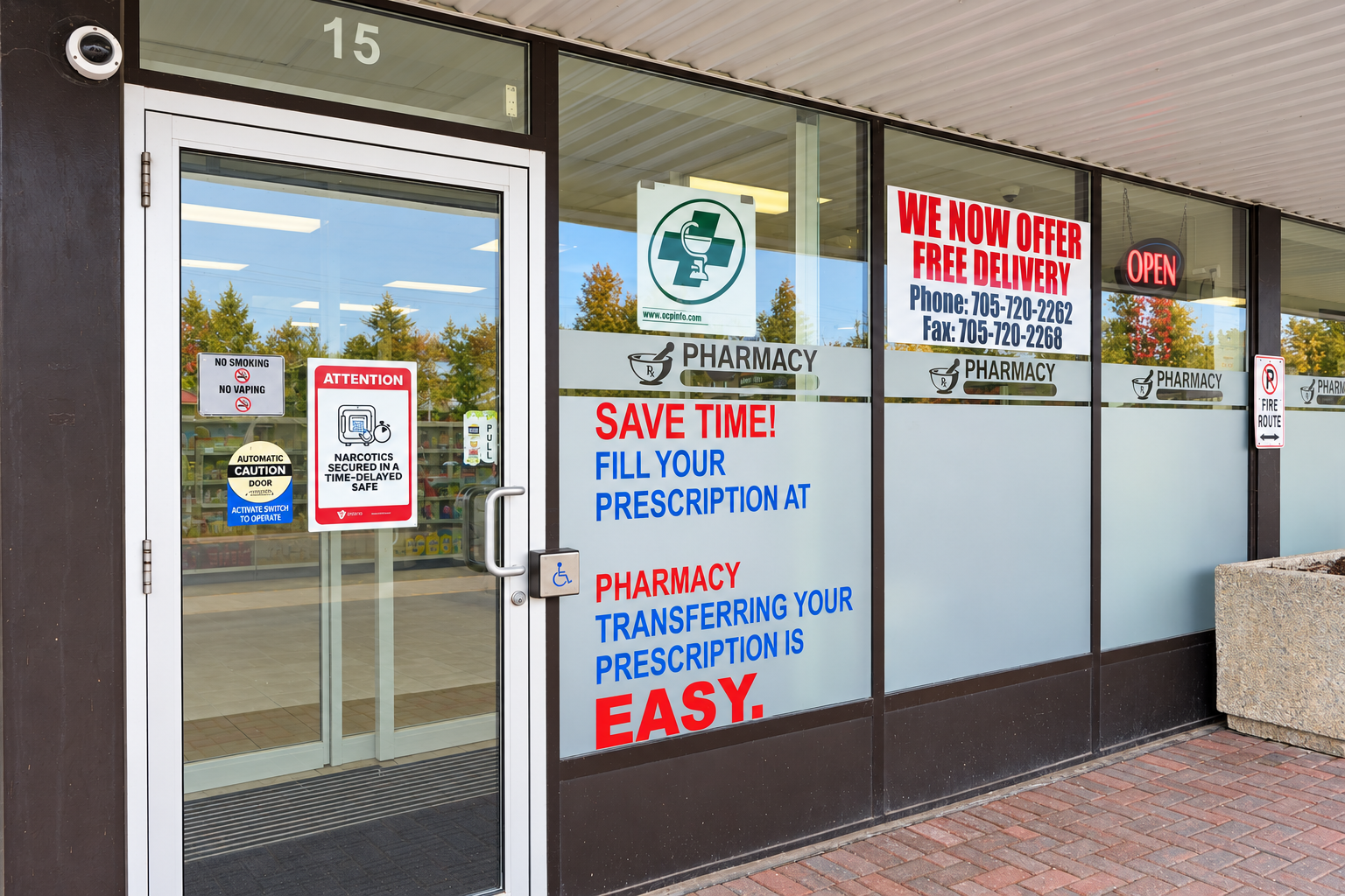 Pharmacy entrance with prescription transfer signage