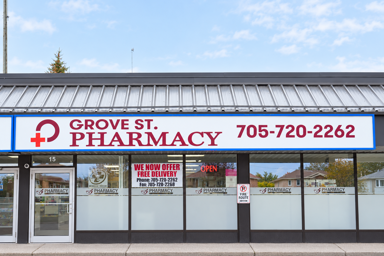 Grove St. Pharmacy storefront sign at Unit 15